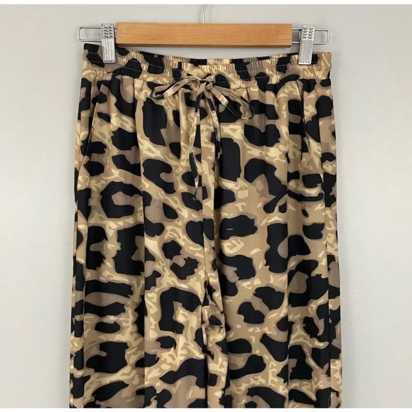 By Egreis NWOT Cheetah Flare Pants - Picture 2 of 6